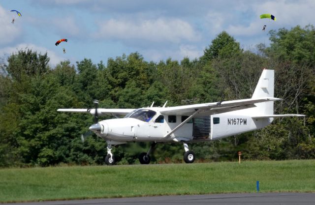 Cessna Caravan (N167PM) - Shown on the departing runway is this Cessna Caravan currently configured for hosting skydiving in the Summer of 2018.