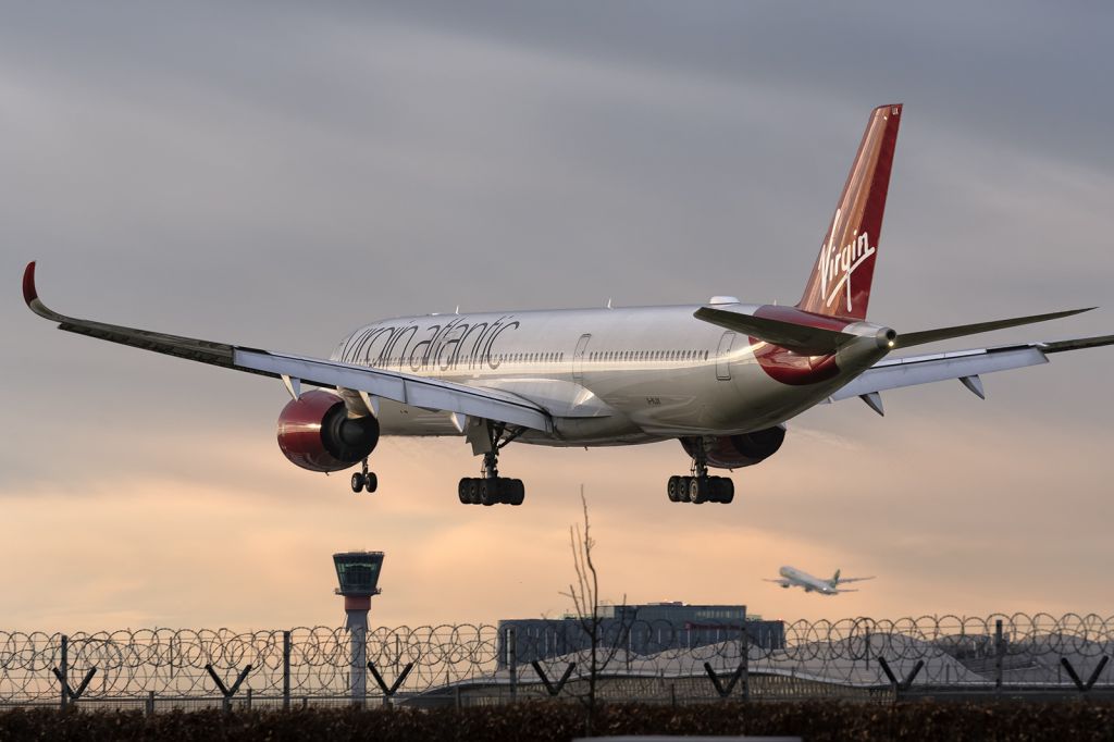 Airbus A350-1000 (G-VLUX) - 2nd Feb., 2022: "Red Velvet" arriving from Lagos is seen gliding over the piano keyboards on runway 27L at London Heathrow. Saudia B773 is seen taking off from parallel runway 27R.