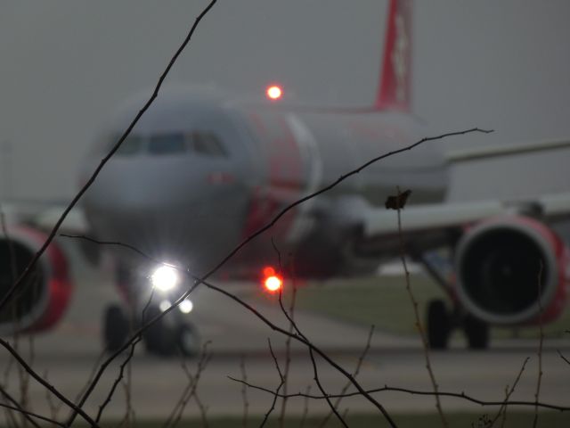 Airbus A321neo (G-SUNO) - G-SUNO turning onto RWY23L as LS937 to Paphos, Cyprus