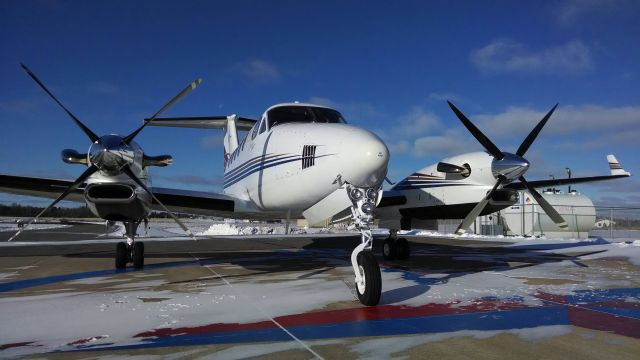 Beechcraft Super King Air 300 (N300MC) - 21 degrees on a sunny day in November.