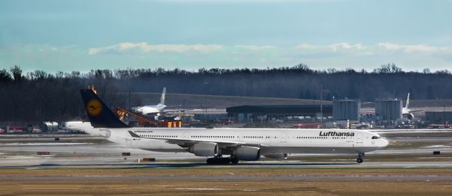 Airbus A340-300 (D-AIHU) - Lufthansa Airbus A340 Taxxing 21L at Detroit Metropolian Airport on Jan 23rd, 2016.