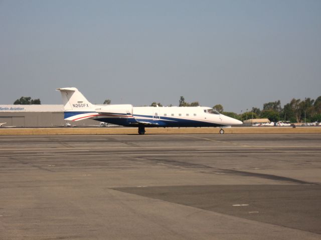 Learjet 60 (N260FX) - Taxiing at Santa Ana