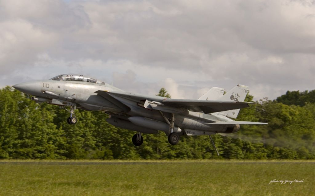 Grumman F-14 Tomcat (UNK) - Vice Admiral James A Winnefeld Jr or as he was known on the set of Top Gun Lt James Jaws Winnefeld makes and emergency landing at Fentres Field in Virginia Beach.  Note the trail of hydraulic fluid.  An all to common event with the Tomcat.