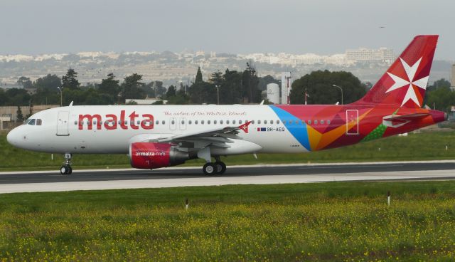 Airbus A320 (9H-AEQ) - On departure RW31