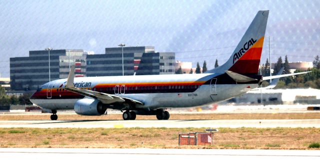 Boeing 737-700 (N917NN) - Operating as AA # 2431 to DFW .. unregistered as American Airlines, AIR CAL livery jet. AIRCAL (Air California) merged with American Airlines in 1987. Was great to see this jet, at what was once, one of AIRCALs former daily destinations.
