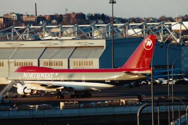 Boeing 747-200 (N642NW) - Northwest B747-212B at Boston Logan Airport on March 9, 2003 doing a military charter.