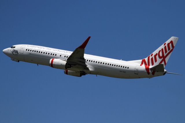 Boeing 737-800 (VH-VUD) - TAKEN THRU THE GLASS OF THE DEPARTURES LOUNGE