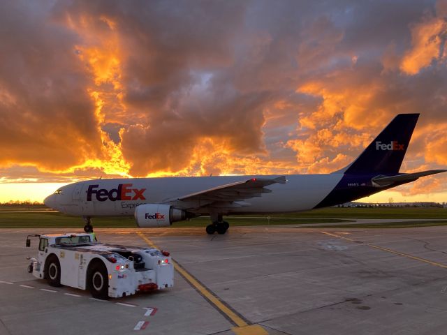 Airbus A300F4-600 (N664FE) - GE CF6-80 Engines humming as the Push Back Vehicle reverses to its parking spot. 