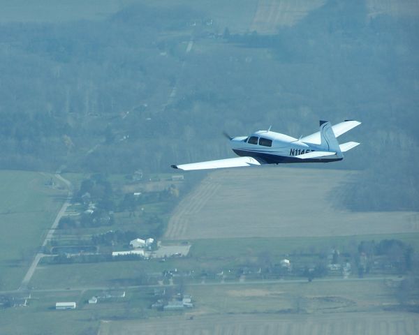 Mooney M-20 (N1145T) - My 1981 M20J N1145T in flight taken from friends Bellanca Super Viking on our way from Delaware, Ohio to Cleveland