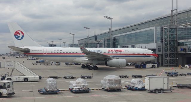 Airbus A330-200 (B-5938) - At gate.