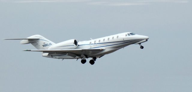 Cessna Citation X (N980JS) - Shortly after departure is this 2001 Cessna 750 Citation in the Winter of 2023.  KPNE - KASE