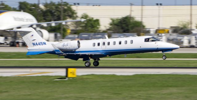 Learjet 45 (N4454N) - Landing on runway 22