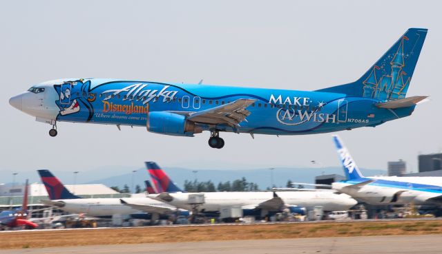 Boeing 737-700 (N706AS) - Make A Wish and Disneyland themed B737 landing at KSEA.