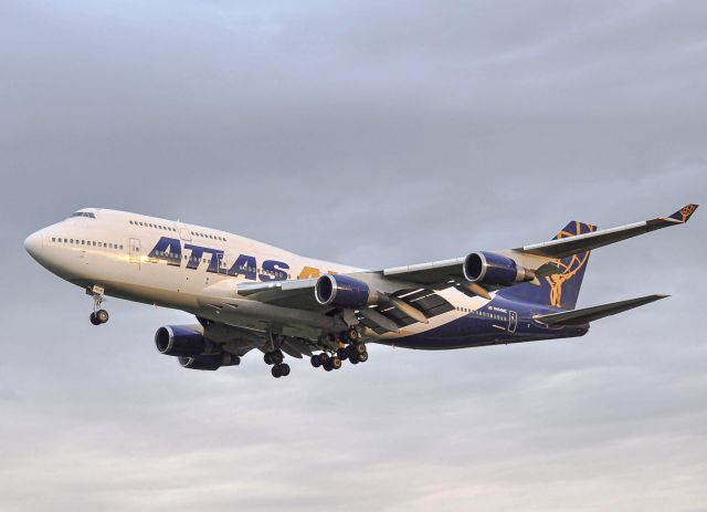 Boeing 747-200 (N464MC) - Giant 8987 on final for runway 3R at DTW during the final moments of golden hour. This was a military charter from Dakar, Senegal.br /br /8/31/2019br /br / 