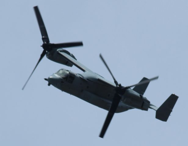 — — - At Wells Street Beach in Gary, Indiana watching the Osprey line up for it"s pass over the crowd at the City Of Gary Air Show