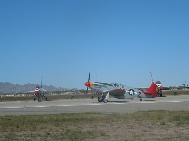 North American P-51 Mustang — - A CAF Tuskegee Airmen P-51 taxies past the Thunderbirds at Thunder in the Desert 2014.