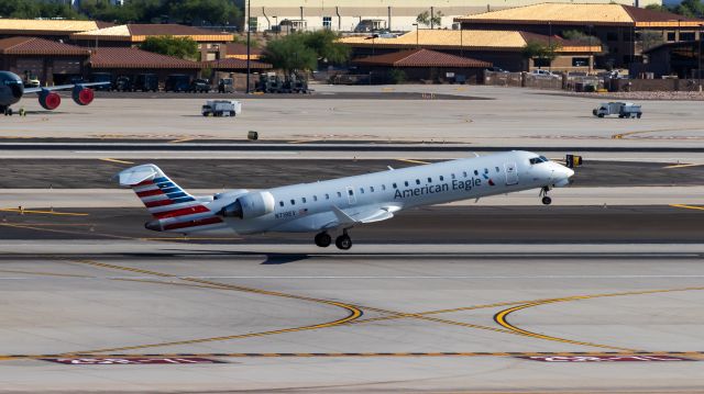 Canadair Regional Jet CRJ-700 (N719EV) - American Eagle CRJ-700 taking off from PHX on 7/1/22. Taken with a Canon 850D and Canon 75-300mm lens.