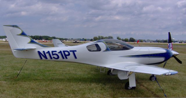 Lancair Legacy 2000 (N151PT) - Repeat visitor to Oshkosh is this Lancair Legacy N151PT of Zeeland, Michigan. The Lancair Legacy (LEG2) is powered by IO-550 engine via a Vortech Supercharger....  As stated in Lancair brochures: "The Heart of a Sport Plane..... the Soul of a Rocket".