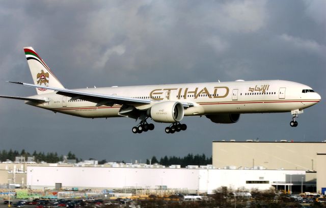 BOEING 777-300 (A6-ETA) - KPAE - pre delivery test flight in Jan 2005 at Boeing Everett - A6-ETA and -ETB were up flying during this short sun break, this was my 1st ever published photo in Airliners mag - and the only photo I have ever sent in for possible publication.