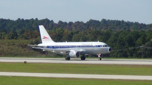 Airbus A319 (N745VJ) - U.S. Airways 1909 to Miami.&amp;ambr />U..S. Airways Heritage Retro Repaint.<br>Taken October 27, 2014.