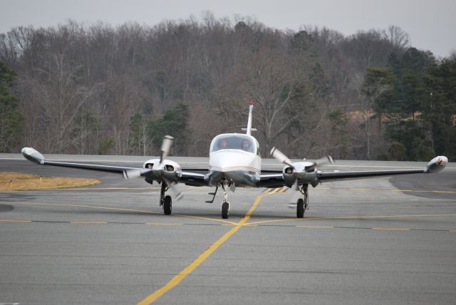 Cessna 310 (N1918J) - Taxiing in after landing on runway 20 at Concord Regional Airport (Concord, NC) - 2/10/09