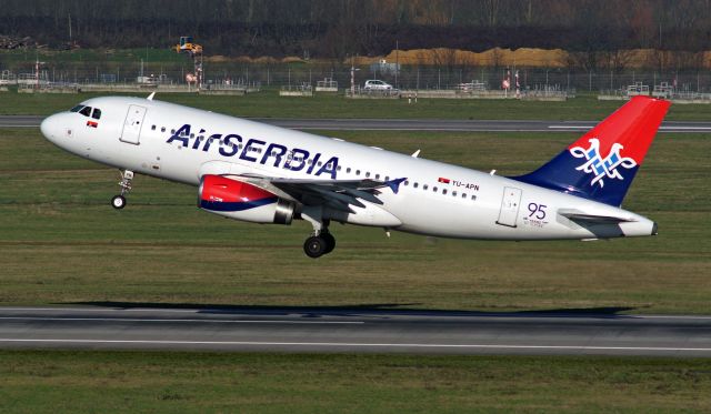 Airbus A319 (YU-APN) - take off at DUS with special logo "95 YEARS OF FLYING"