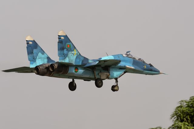 BAF28375 — - 24th April, 2025: Bangladesh Air Force MiG-29UB On short finals to rwy 14 at Dhaka's Zia International Airport. View from Cafe Runway in Dollipara. 