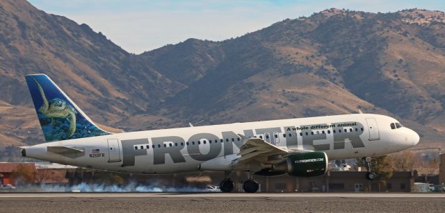 Airbus A320 (N210FR) - For the first time in ten years, a regularly-scheduled FFT flight arrived in Reno at four minutes after "straight up high noon" yesterday when N210FR, Frontiers "Sheldon the Sea Turtle," touched down on Reno Tahoe Internationals 16R.