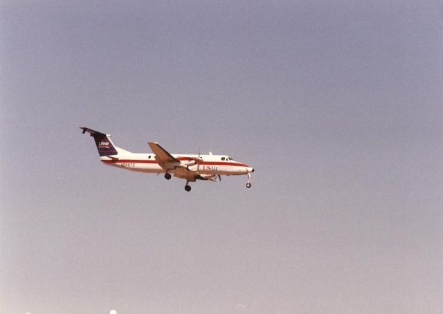 Beechcraft 1900 (N55872) - Landing at Santa Ana in the early 1990s