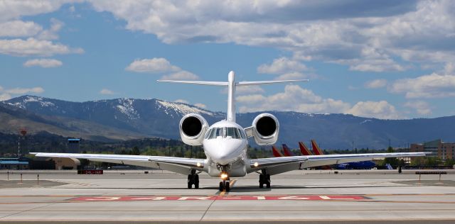 Cessna Citation X (N750XJ) - XOJet's N750XJ, an awesome looking Cessna Citation X, taxies straight toward me as it exits Runway 34R via Juliet Taxiway.