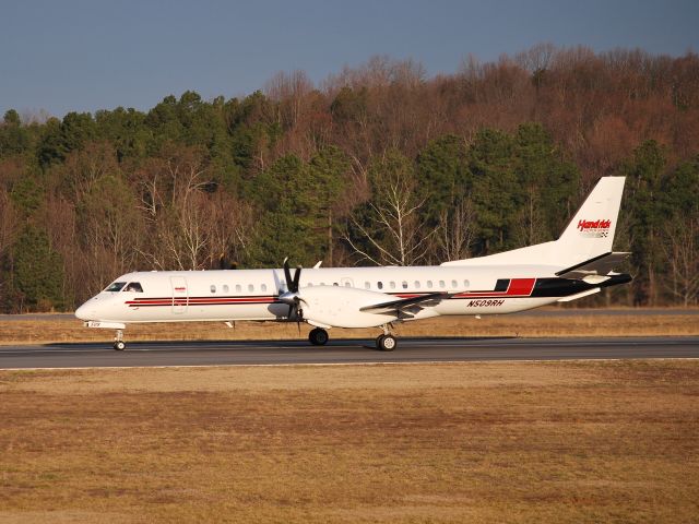 Saab 2000 (N509RH) - Taking off on runway 20 at Concord Regional Aiport, bound for Daytona - 2/15/09