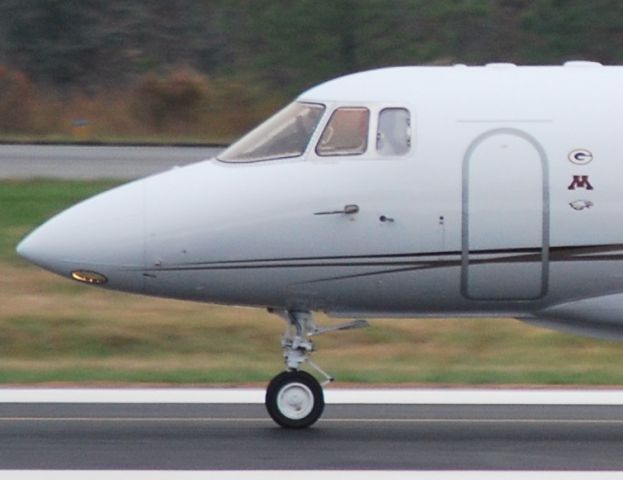 Hawker 1000 (N850JA) - Rolling down runway 20 at Concord Regional Airport (KJQF) - 11/19/09