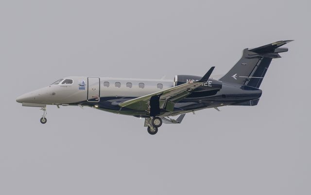 Embraer Phenom 300 (N304EE) - Runway 20R arrival @KDPA.