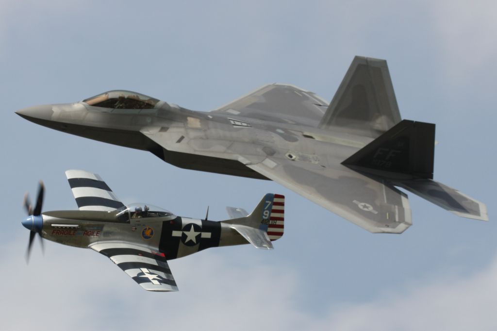 — — - North American P-51K "Fragile but Agile" with the USAF ACC Lockheed Martin F-22 Raptor Demo performing a USAF Heritage Flight at the 2015 New York Airshow