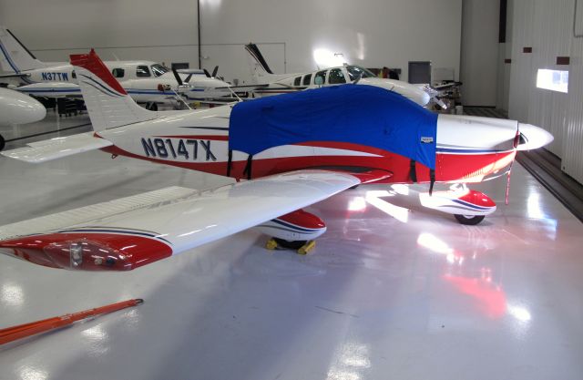 Piper Cherokee (N8147X) - In the RELIANT AIR hangar. RELIANT AIR offers a great service and the lowest fuel price on the Danbury (KDXR) airport.