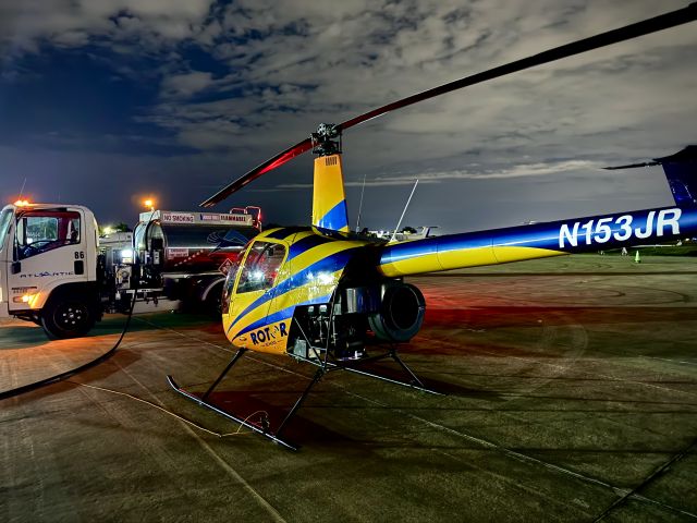 Robinson R-22 (N153JR) - N153JR Refuelling at KSRQ on a night cross-country.