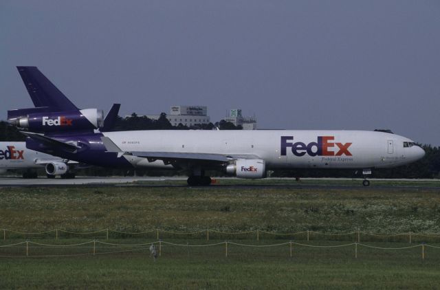 Boeing MD-11 (N583FE) - Departure at Narita Intl Airport Rwy16R on 1998/06/21