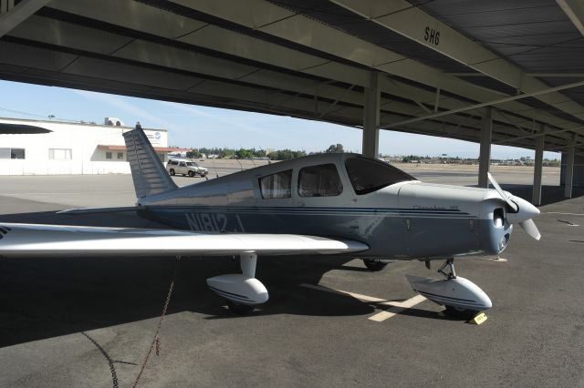 Piper Cherokee (N1812J) - Parked at Fresno Chandler Executive in Fresno, California on April 12, 2015.