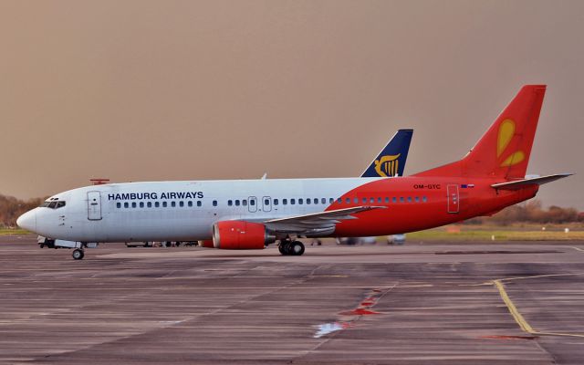 BOEING 737-400 (OM-GTC) - hamburg airways b737-4 om-gtc arriving in shannon on a rugby charter (munster v clermont)5/12/14.