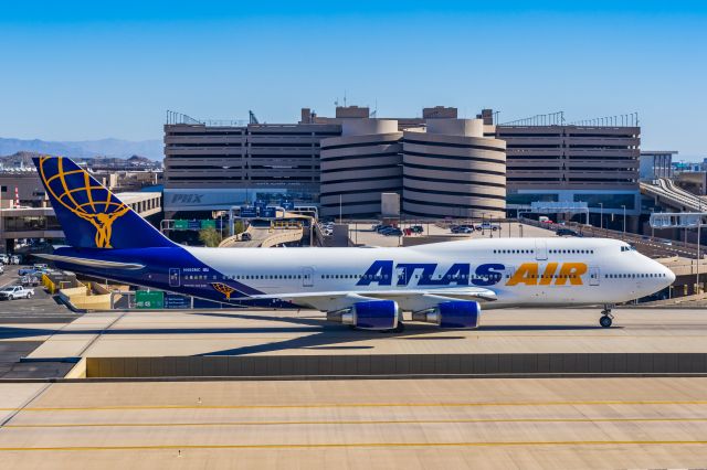 Boeing 747-400 (N482MC) - An Atlas Air 747-400 taxiing at PHX on 2/10/23 during the Super Bowl rush. Taken with a Canon R7 and Tamron 70-200 G2 lens.