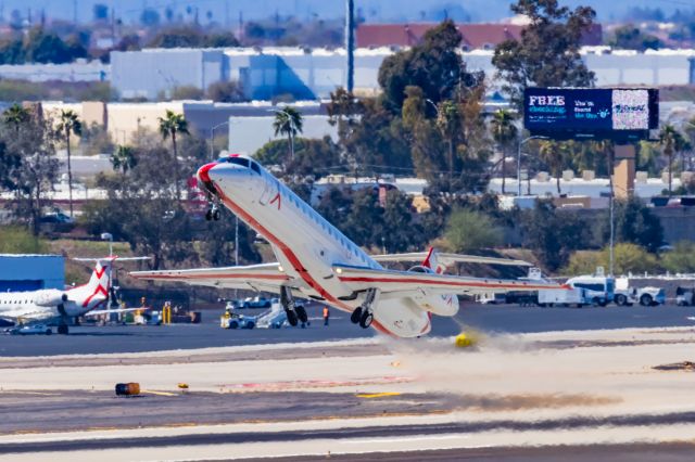 Embraer ERJ-135 (N918JX) - A JSX ERJ135 taking off from PHX on 2/24/23. Taken with a Canon R7 and Canon EF 100-400 ii lens.