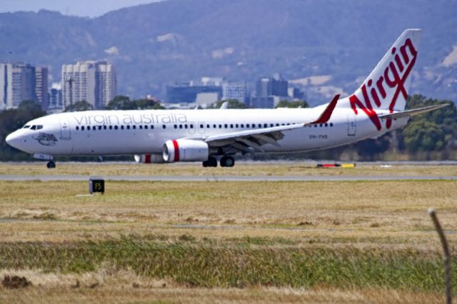 Boeing 737-800 (VH-YVA) - On taxi-way heading for Terminal 1, after landing on runway 23, on the last day of the Australian summer. Thursday 28th February 28th 2013.