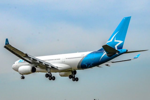 Airbus A330-200 (C-GTSI) - Here is a Air Transat new livery soaring over airport road at CYYZ