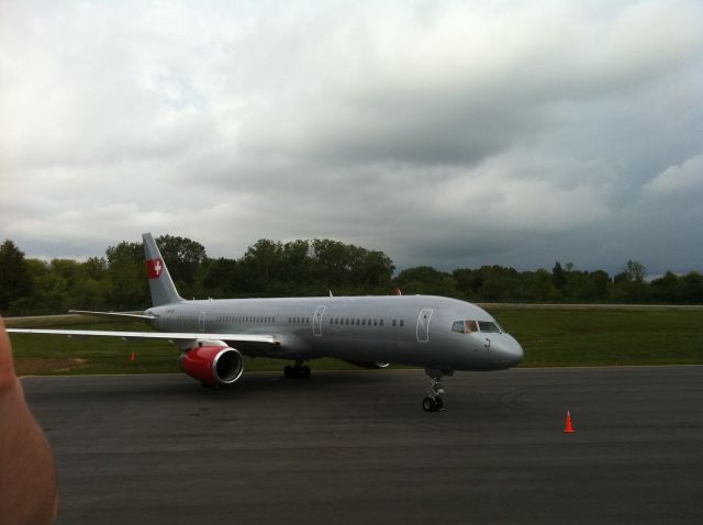 Boeing 757-200 (HB-IEE) - PrivatAir B757-200 sits on the Wilson Air Center CHA ramp on Sept 22-24, 2011