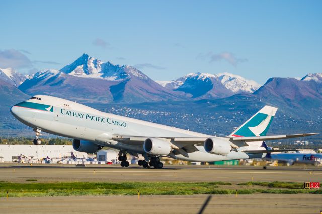 BOEING 747-8 (B-LJF) - Caught at the exact moment of rotation. Cathay Pacific Boeing 748 launches from Anchorages (PANC) Runway 33.©Bo Ryan Photography | Please vote if you like the image!