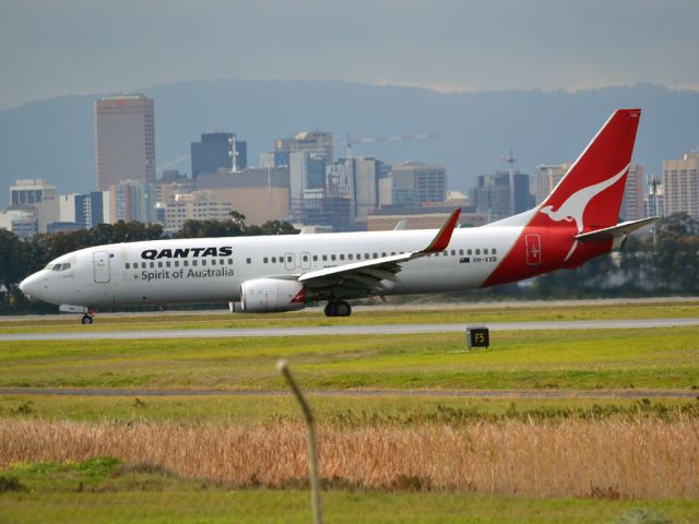 Boeing 737-800 (VH-VXR) - On taxi-way heading for Terminal 1, after landing on runway 23. Wednesday 4th July 2012.