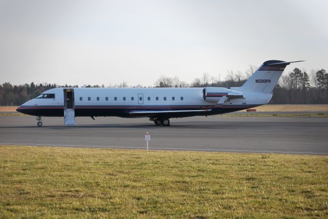 Canadair Regional Jet CRJ-200 (N500PR) - Parked at Concord Regional Aiport, soon departing for Daytona - 2/15/09  Registered Owner:  Penske Jet Inc.