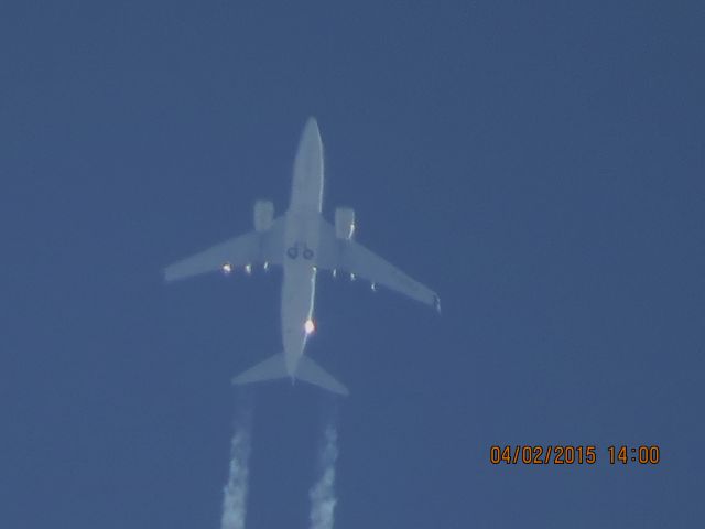 Boeing 737-700 (C-GSWJ) - WestJet Airlines flight 2437 from CUN to YWG over Southeastern Kansas at 38,000 feet.