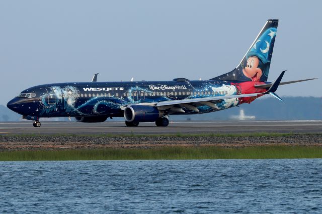 Boeing 737-800 (C-GWSZ) - Westjet's 'Disney Magic' special livery departing back to Calgary