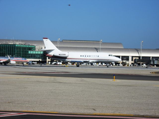 Dassault Falcon 2000 (N233QS) - Line up and wait on RWY 19R
